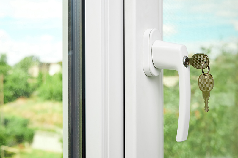 white window handle lock closeup